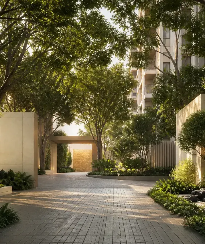 Prestige Sonnenahalli, artistic impression A paved arrival court under the trees, leading to a lit entrance
